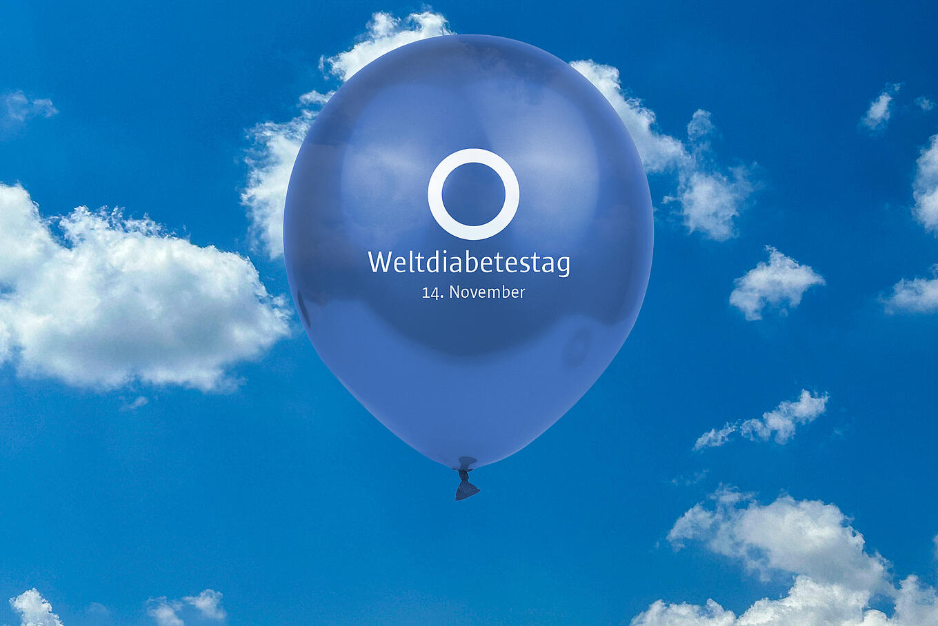 Illustration eines blauen Ballons mit der Aufschrift Weltdiabetestag 14. November.
